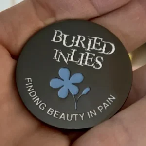 Buried in Lies & Auricular Impalement Coin